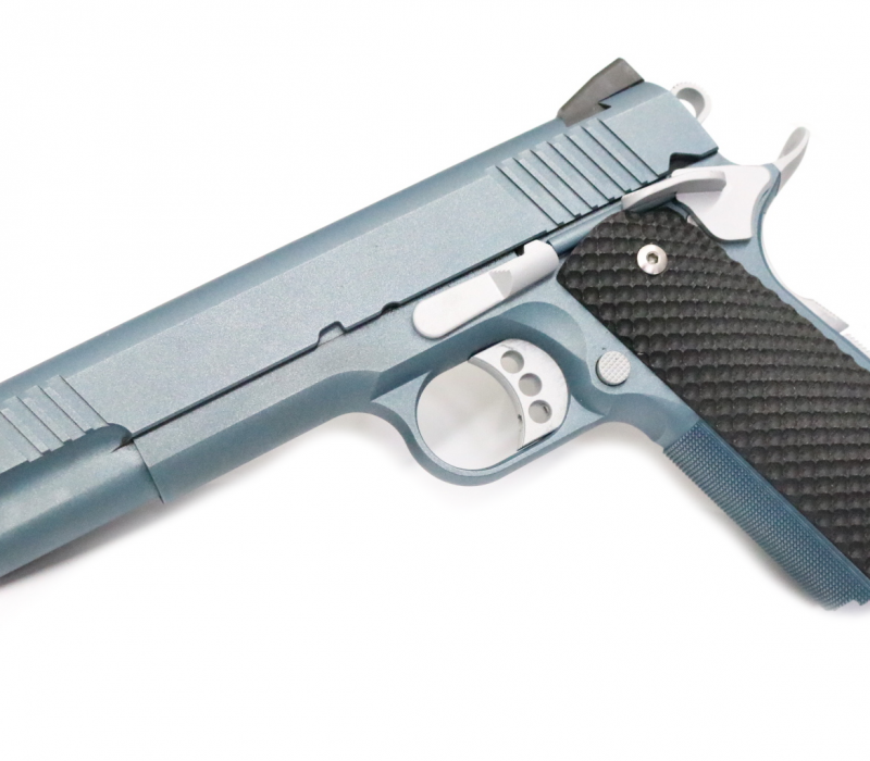 1911 full size 9mm with checkered grip and novak slide